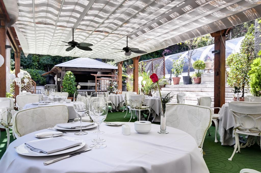 Hotel Miguel Angel Мадрид Экстерьер фото The restaurant