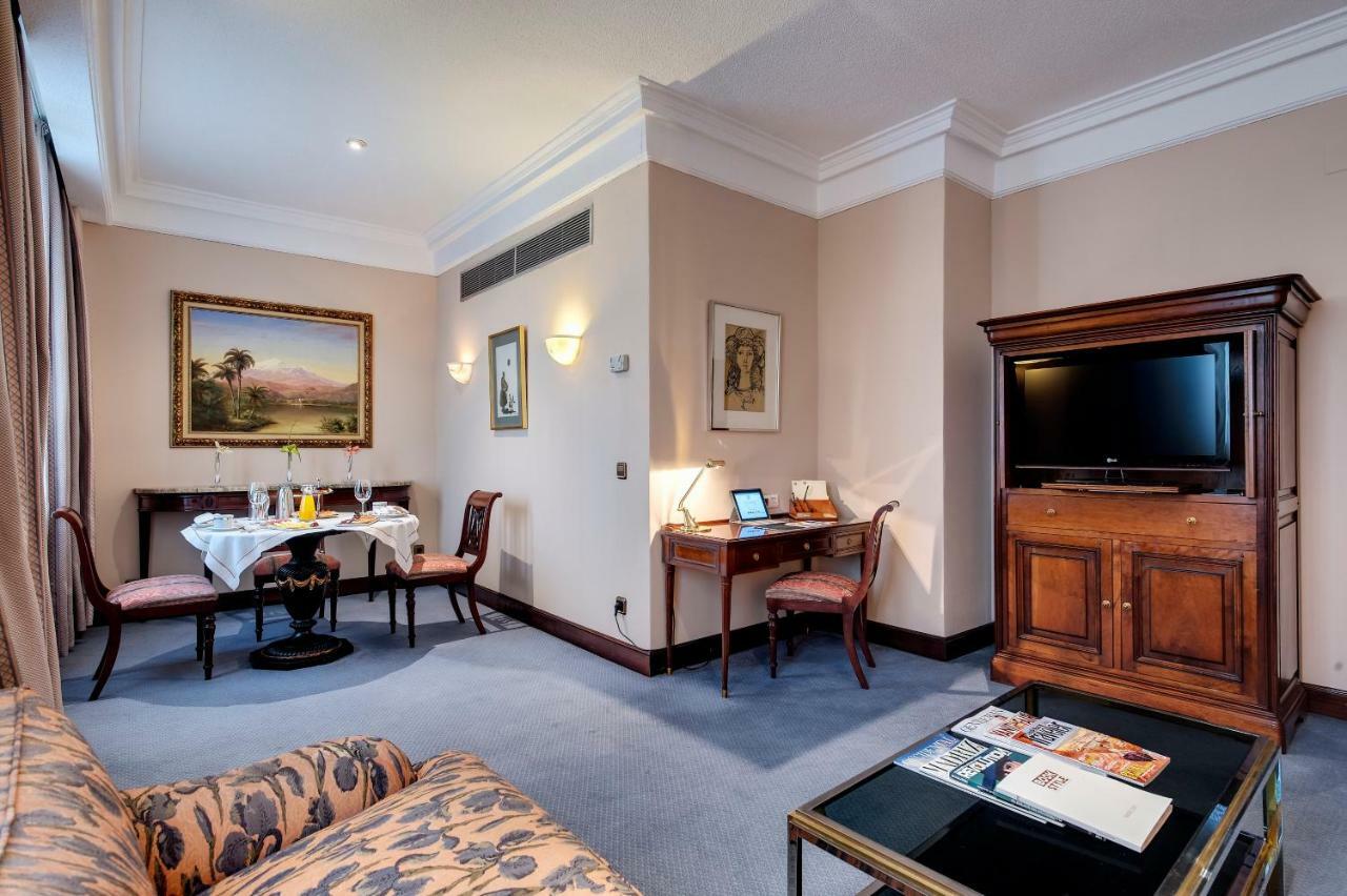 Hotel Miguel Angel Мадрид Экстерьер фото A suite at the hotel