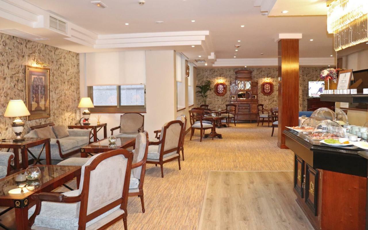 Hotel Miguel Angel Мадрид Экстерьер фото The lounge at the airport