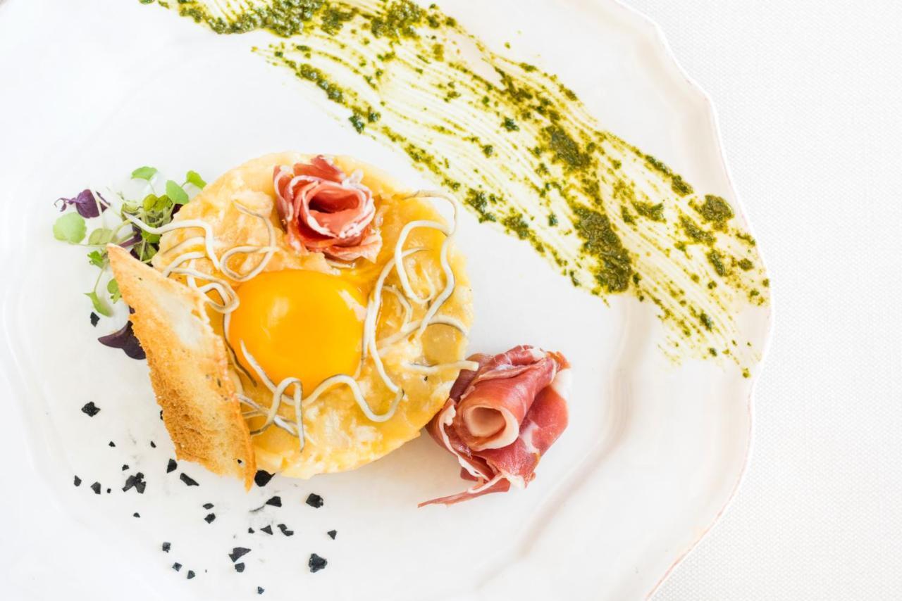 Hotel Miguel Angel Мадрид Экстерьер фото A modern Italian dessert